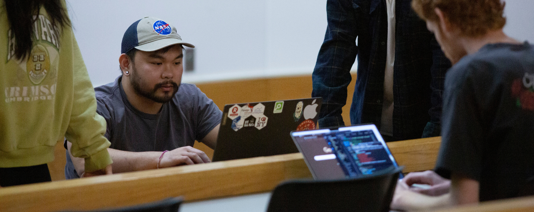 Students work on building a small drone.
