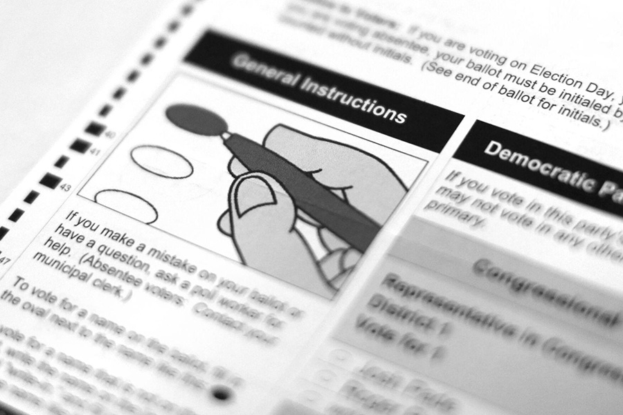 Black and white image of voting instructions.