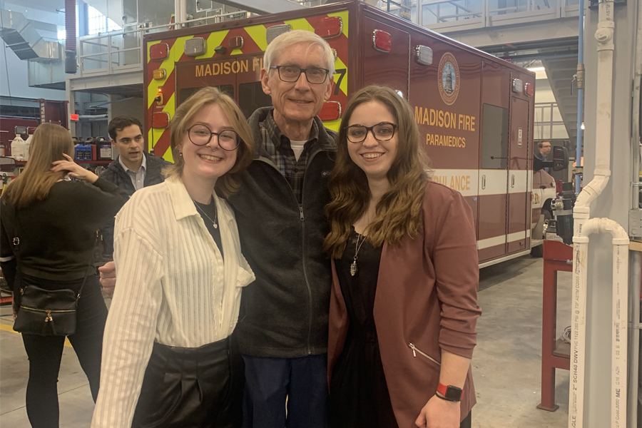 Salem Radey and Kelsey Preisler pose for a pciture with Governor Tony Evers.