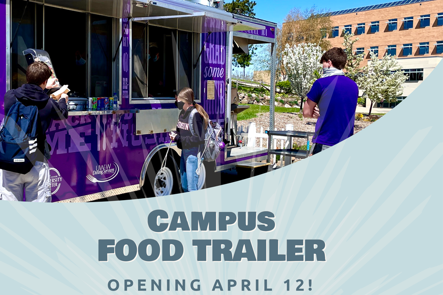 Food trailer with students ordering food graphic.
