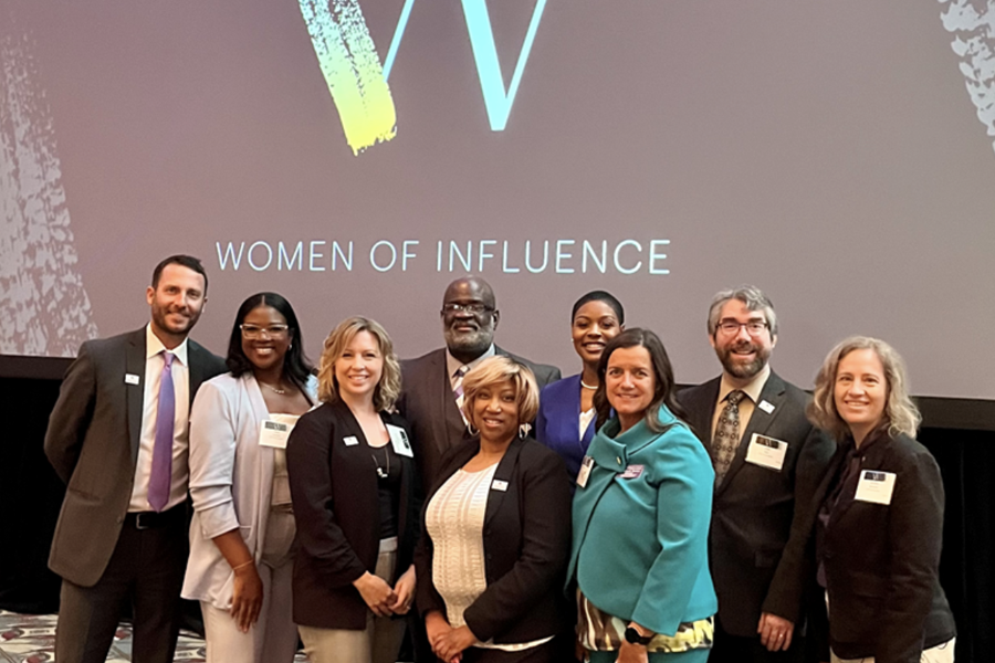 Group of people at a Women of Influence event.