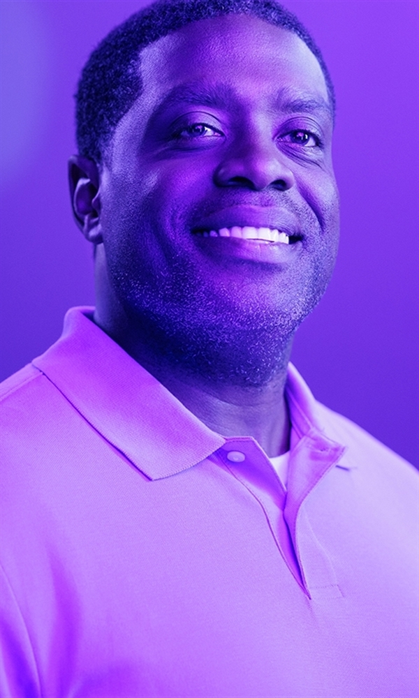 Student poses for College of Business photo shoot