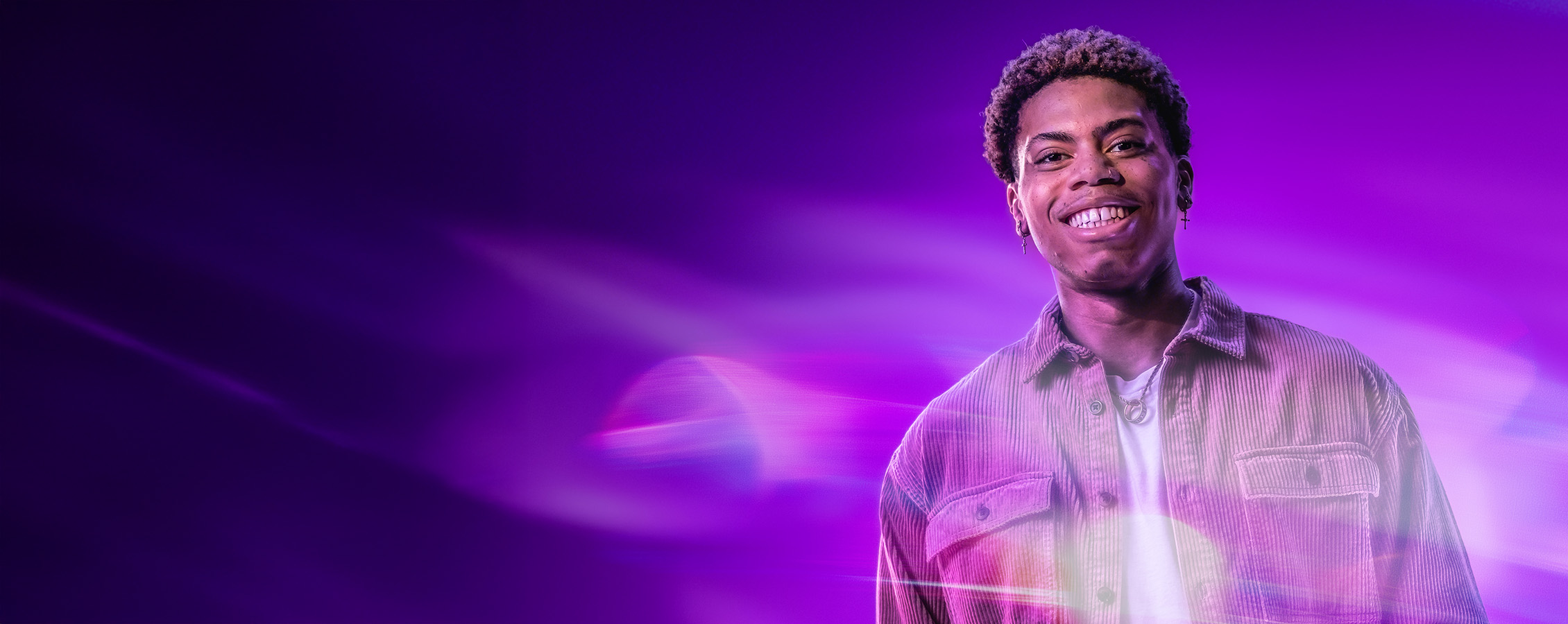 Young man poses for UW-Whitewater College of Business and Economics online 