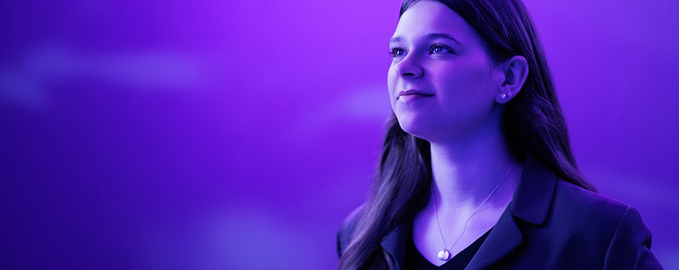 Young woman poses for UW-Whitewater College of Business and Economics online 