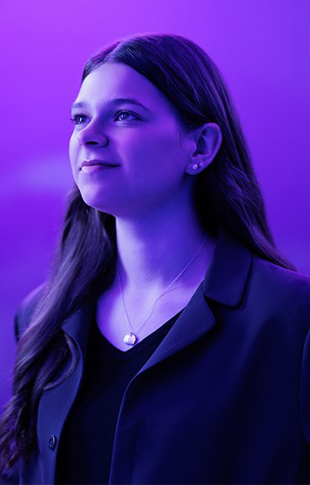 Young woman poses for UW-Whitewater College of Business and Economics online 