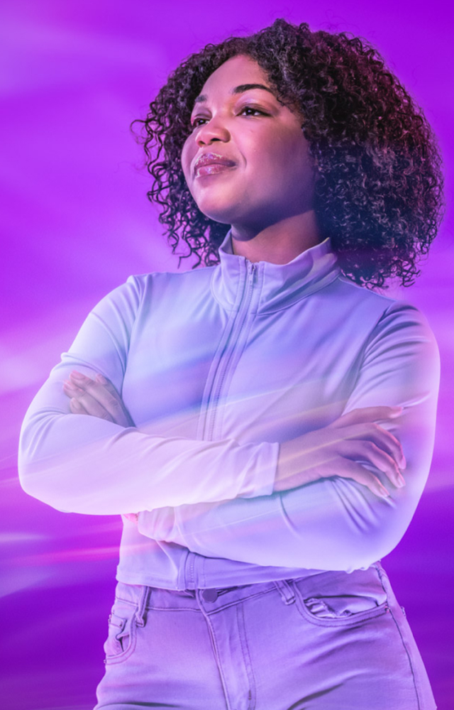 Woman standing and posing for online class, first video frame