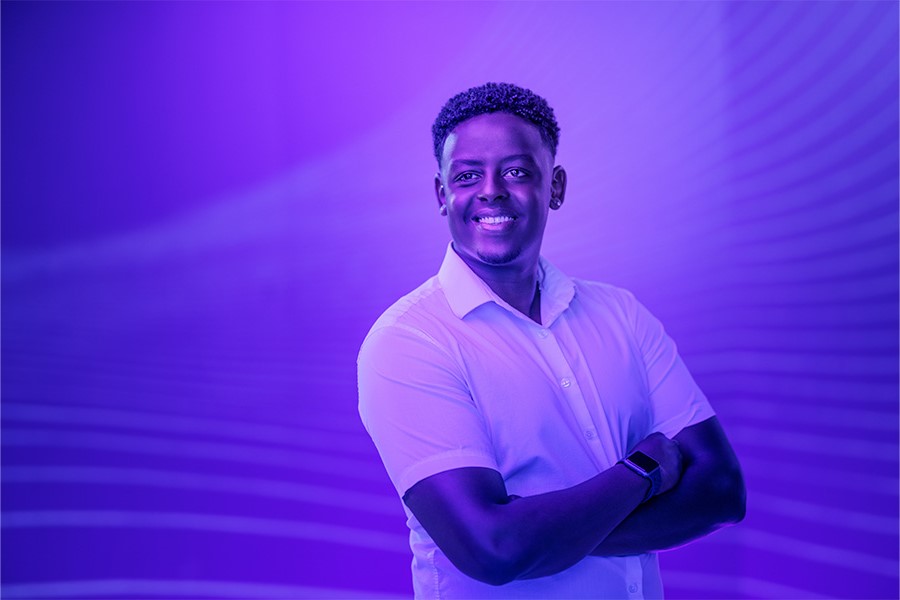 A person in purple lighting. 