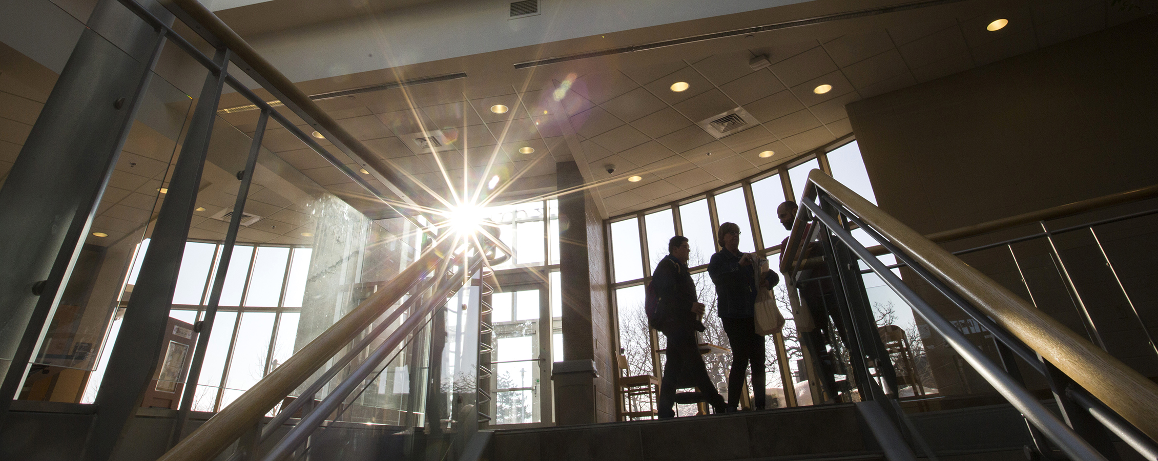 Entryway with the sun shining through the windows.